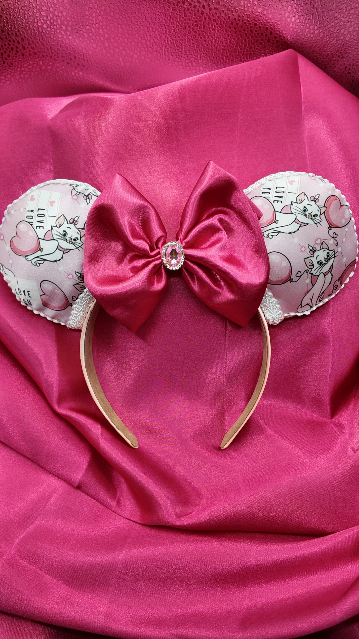 Marie Cat Ears Headband With Satin Bow Pink Featuring Adorable Cat Prints and Sparkling Rhinestone Center