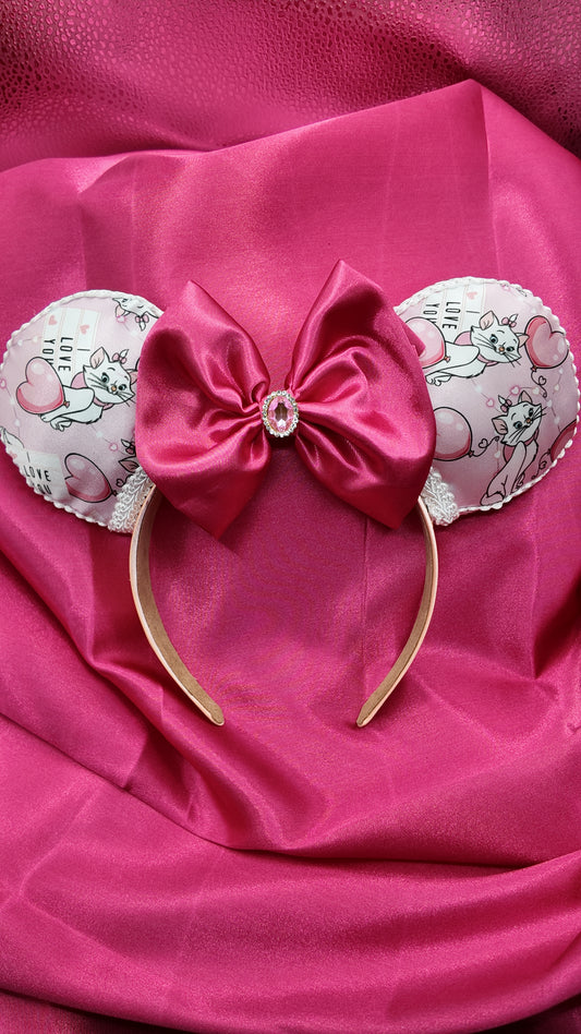Marie Cat Ears Headband With Satin Bow Pink Featuring Adorable Cat Prints and Sparkling Rhinestone Center