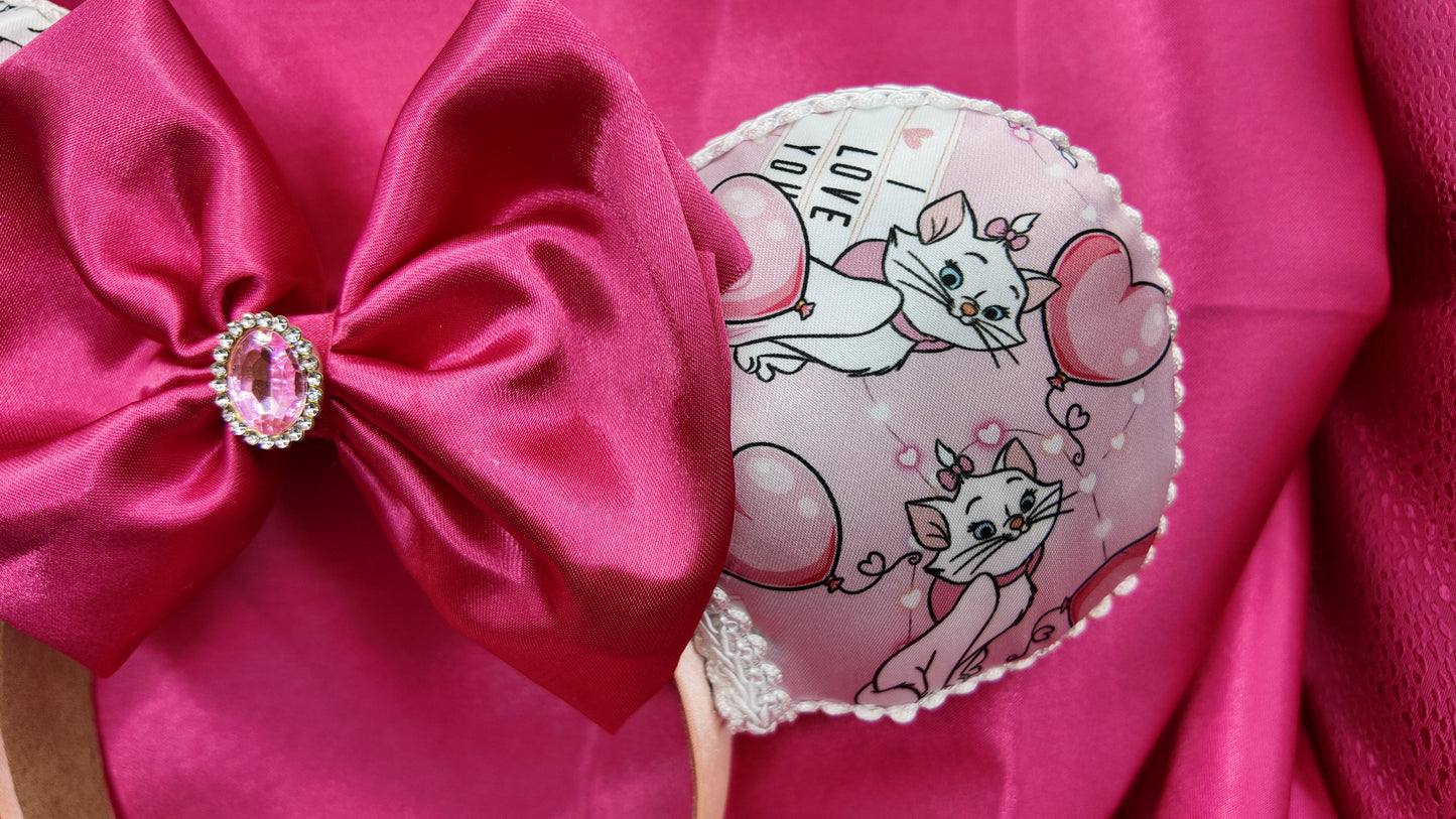 Marie Cat Ears Headband With Satin Bow Pink Featuring Adorable Cat Prints and Sparkling Rhinestone Center